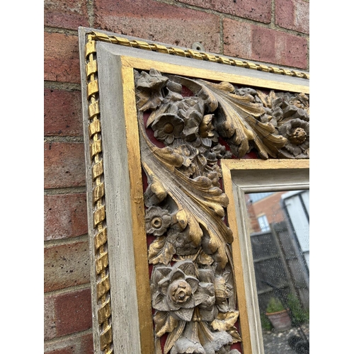 12 - A large George III style grey painted and gilt decorated mirror height 180cm, width 124cm