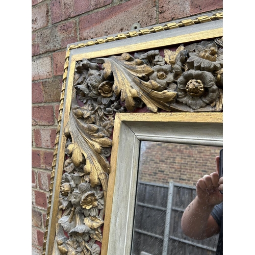 12 - A large George III style grey painted and gilt decorated mirror height 180cm, width 124cm