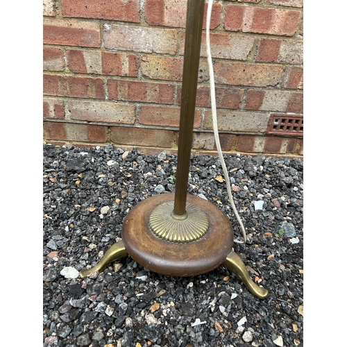 14 - A French Art Deco brass and mahogany standard lamp 175cm