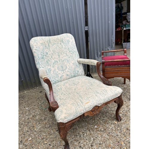 142 - An Edwardian mahogany framed armchair together with a piano stool and a lantern floor standing  ligh... 