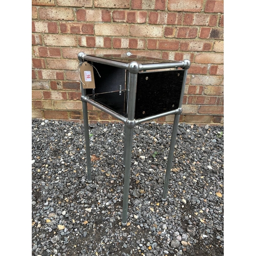 16 - An Art Deco chrome and black glass bedside/side table