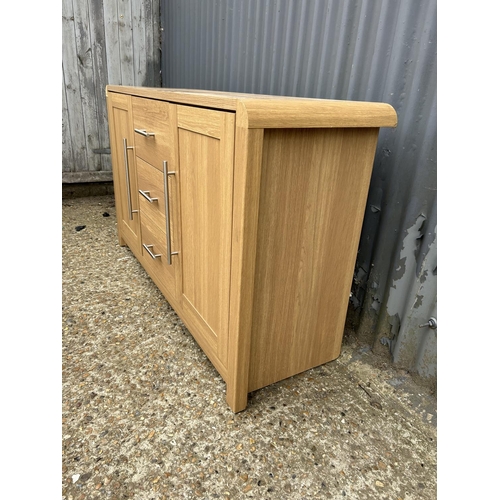 179 - A modern beach effect sideboard 130 x44x77