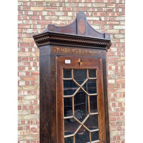 17a - An Irish George III and later mahogany standing corner cupboard