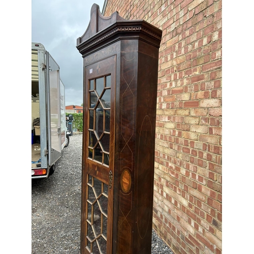 17a - An Irish George III and later mahogany standing corner cupboard