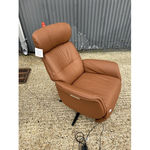 188 - A stylish modern tan brown electric reclining chair