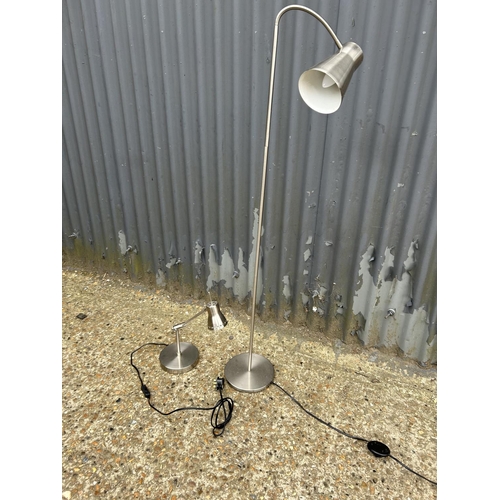 199 - A steel floor lamp, and a desk lamp