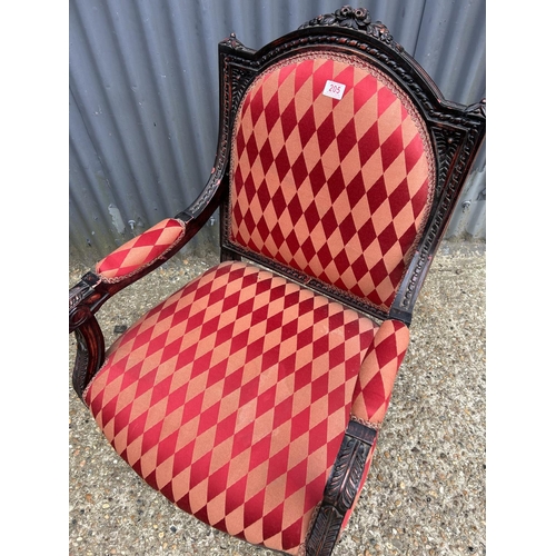 205 - A carved frame throne chair with red diamond pattern