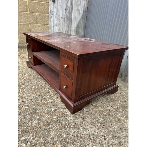 207 - A reproduction mahogany double sided coffee table with four drawers to each side 124x 63x50