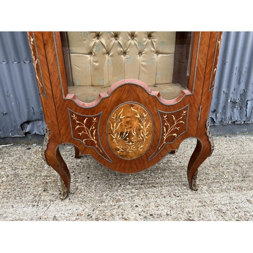 208 - An inlaid Kingwood display cabinet with glass internal shelves and gilt mounts 82x50x190