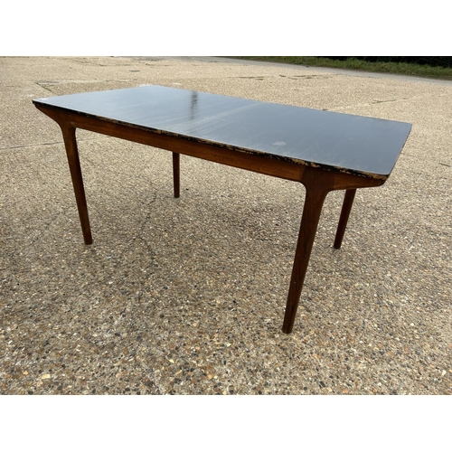 224 - A MCINTOSH TEAK TWO LEAF EXTENDING DINING TABLE (top painted black)