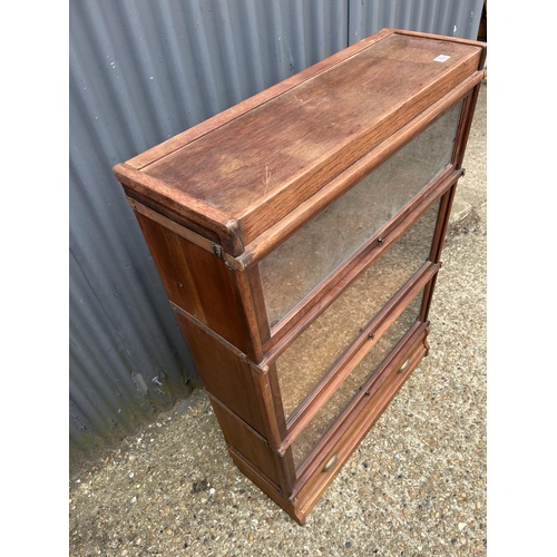 232 - An original GLOBE  WERNICKE Mahogany three section stacking bookcase with drawer  86x30 x120