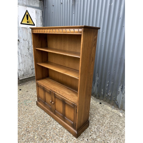 237 - An ercol golden dawn open front bookcase 102x30x140