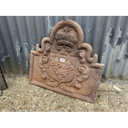 239 - A cast iron fire back 60x 60 together with a metal fire guard