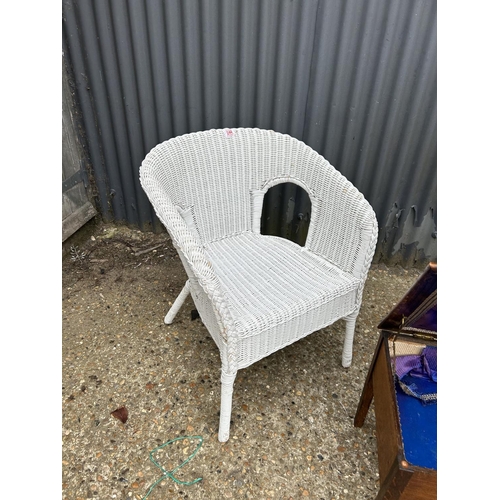 244 - A white wicker loom style chair together with an oak sewing box