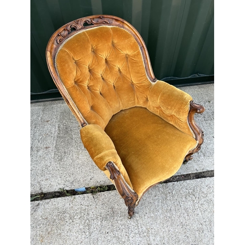 26 - A victorian gold upholstered button back nursing chair