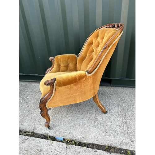 26 - A victorian gold upholstered button back nursing chair