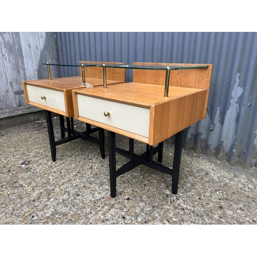 273 - A pair of G plan light oak single drawer bedsides with glass floating surface tops