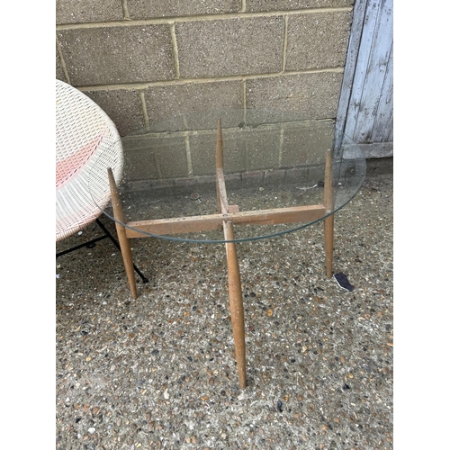 278 - A RETRO BEDROOM CHAIR TOGETHER WITH A GLASS TOP COFFEE TABLE WITH FOLDING TEAK BASE