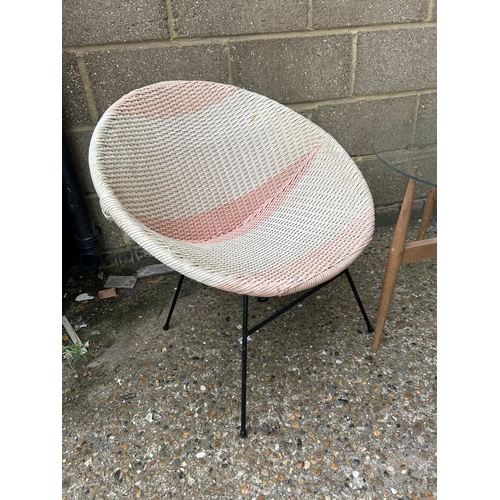 278 - A RETRO BEDROOM CHAIR TOGETHER WITH A GLASS TOP COFFEE TABLE WITH FOLDING TEAK BASE