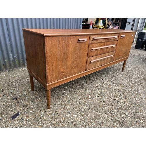 279 - A mid century teak sideboard 176x48x77