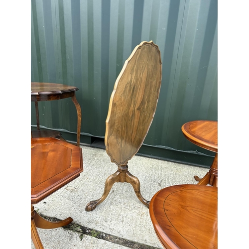 288 - A walnut snap top occasional table with our crust top together with Edwardian occasional table and t... 