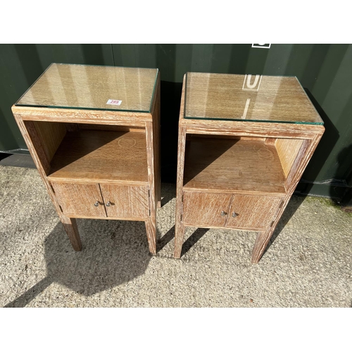 289 - A pair of limed oak bedside tables