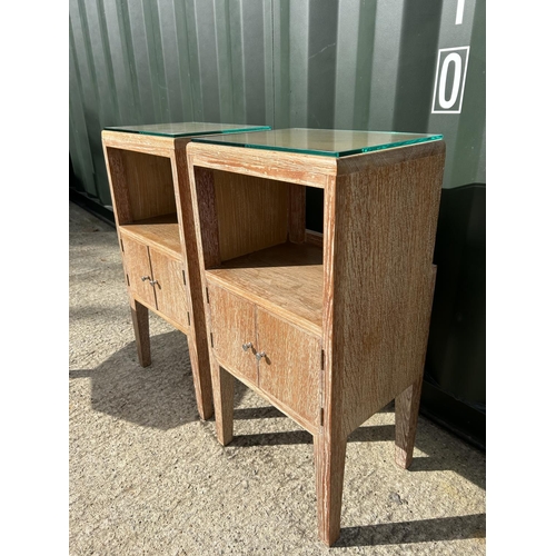 289 - A pair of limed oak bedside tables