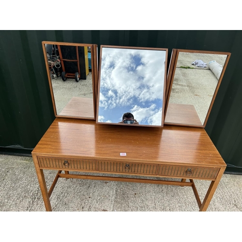 290 - A mid century teak three drawer dressing table