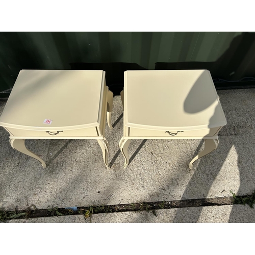 294 - A pair of French style white and gold gilt painted single drawer bedsides