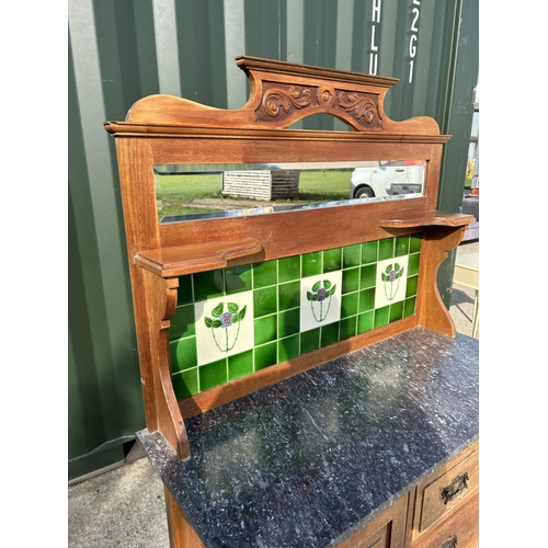 295 - An Edwardian washstand with green tiled back and marble top