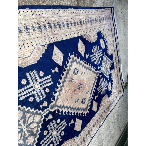 300 - A large blue pattern carpet 182x275