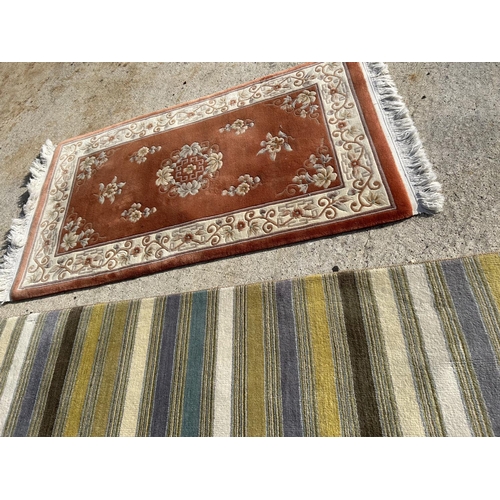 301 - A large modern John Lewis rug 170x240 together with a Chinese pattern terracotta rug