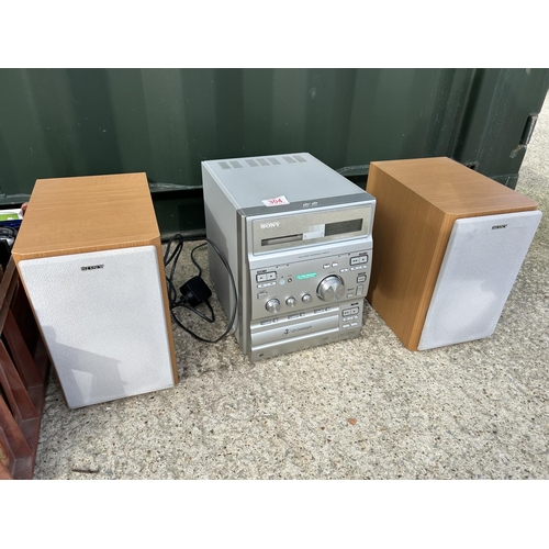 304 - A Sony hifi together with crate of domestic electrical items