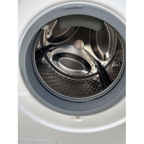 307 - A MEILE Wt1 excellence washer drier with handbook and under counter mounting kit