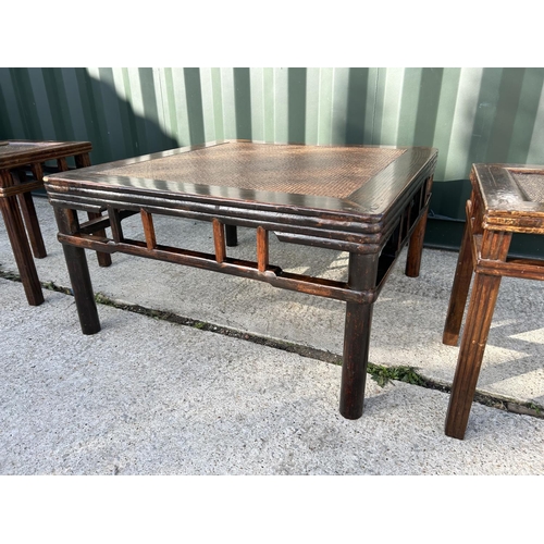 310 - A set of three Indian style hardwood coffee tables (large and two small)