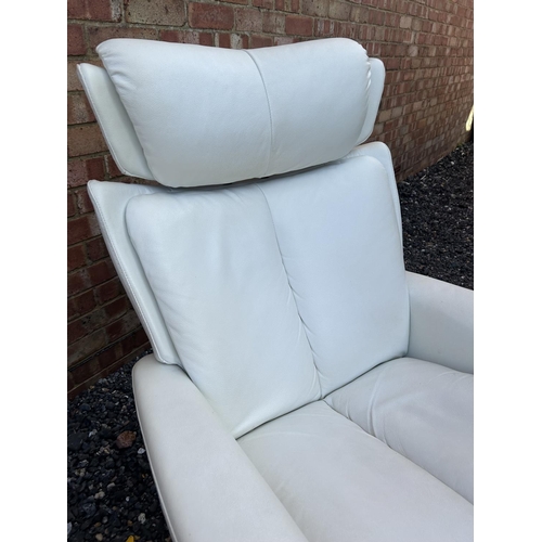 311 - A pair of white leather EKORNES stressless white leather reclining armchairs