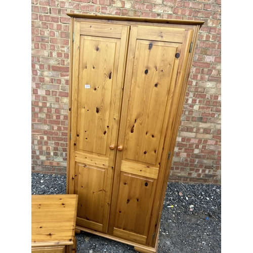 313 - Pine double wardrobe together with matching two drawer bedside