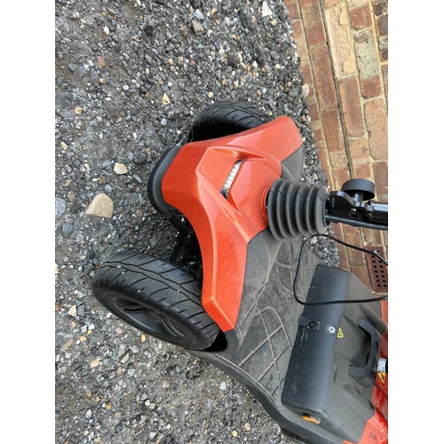 331 - A STRIDE sport mobility scooter in good working order with key and charger