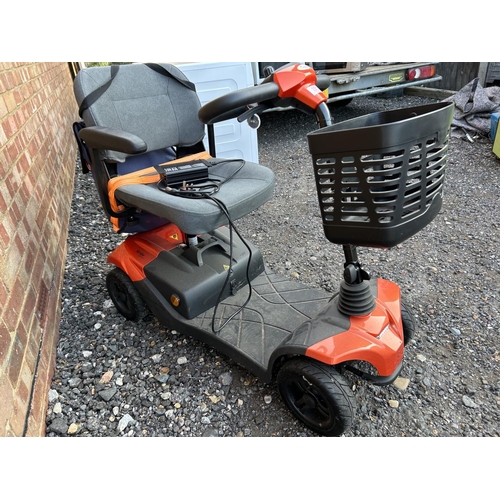 331 - A STRIDE sport mobility scooter in good working order with key and charger