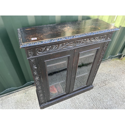 346 - A carved oak two door cabinet 90x30x110