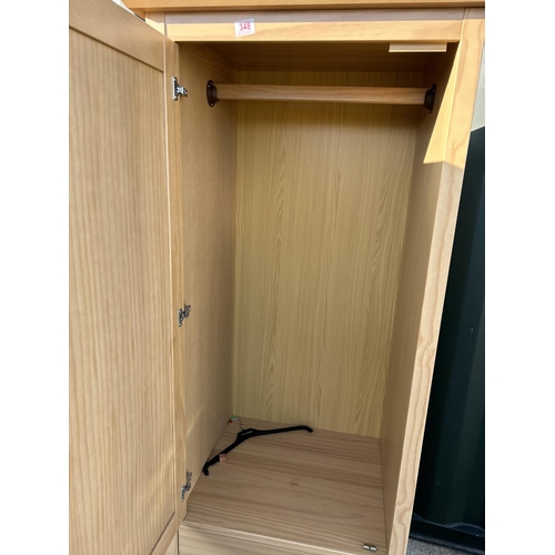 348 - A modern single wardrobe with two drawers