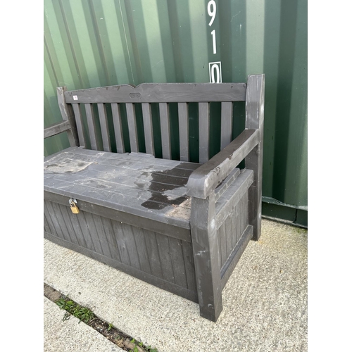 365 - A Keter wood effect garden storage bench