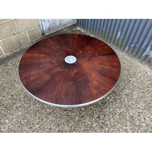 49 - A mid century rosewood and aluminium circular coffee table designed by Paul Cadovius for FRANCE & SO... 