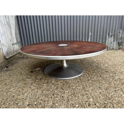 49 - A mid century rosewood and aluminium circular coffee table designed by Paul Cadovius for FRANCE & SO... 