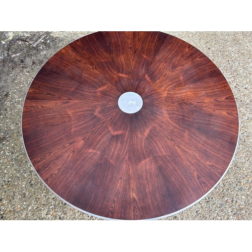 49 - A mid century rosewood and aluminium circular coffee table designed by Paul Cadovius for FRANCE & SO... 