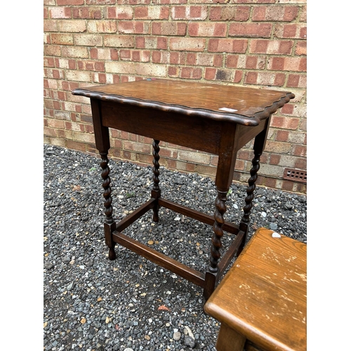 5 - A 20th century oak barley twist gateleg table together with another barley twist table and a oak sid... 