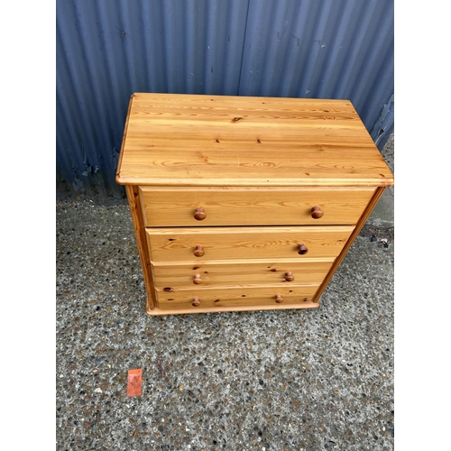 52 - A pine chest of four drawers 77x40x82