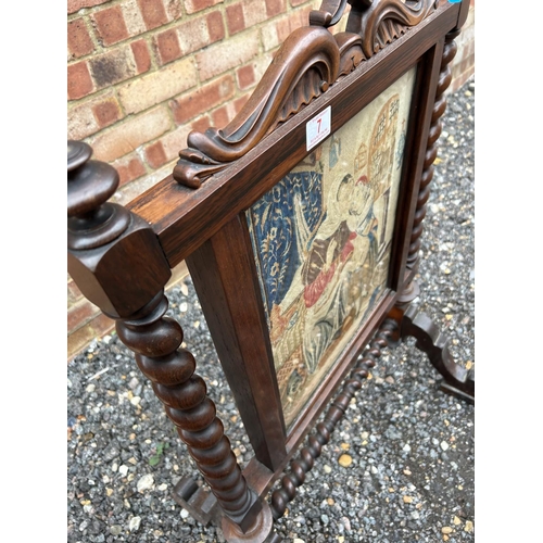 7 - A victorian rosewood fire screen with removable glazed tappestry panel, together with two other oak ... 