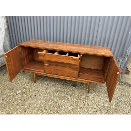 78 - A mid century teak sideboard 152cm wide