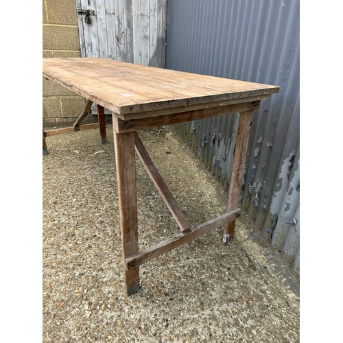 92 - A vintage wooden folding tressel  table